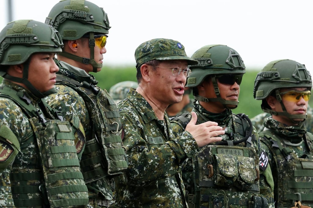 Wellington Koo (centre), Taiwan’s defence minister, speaks during a missile-shooting exercise in Fangshan, Pingtung county, on Monday. Photo: EPA-EFE